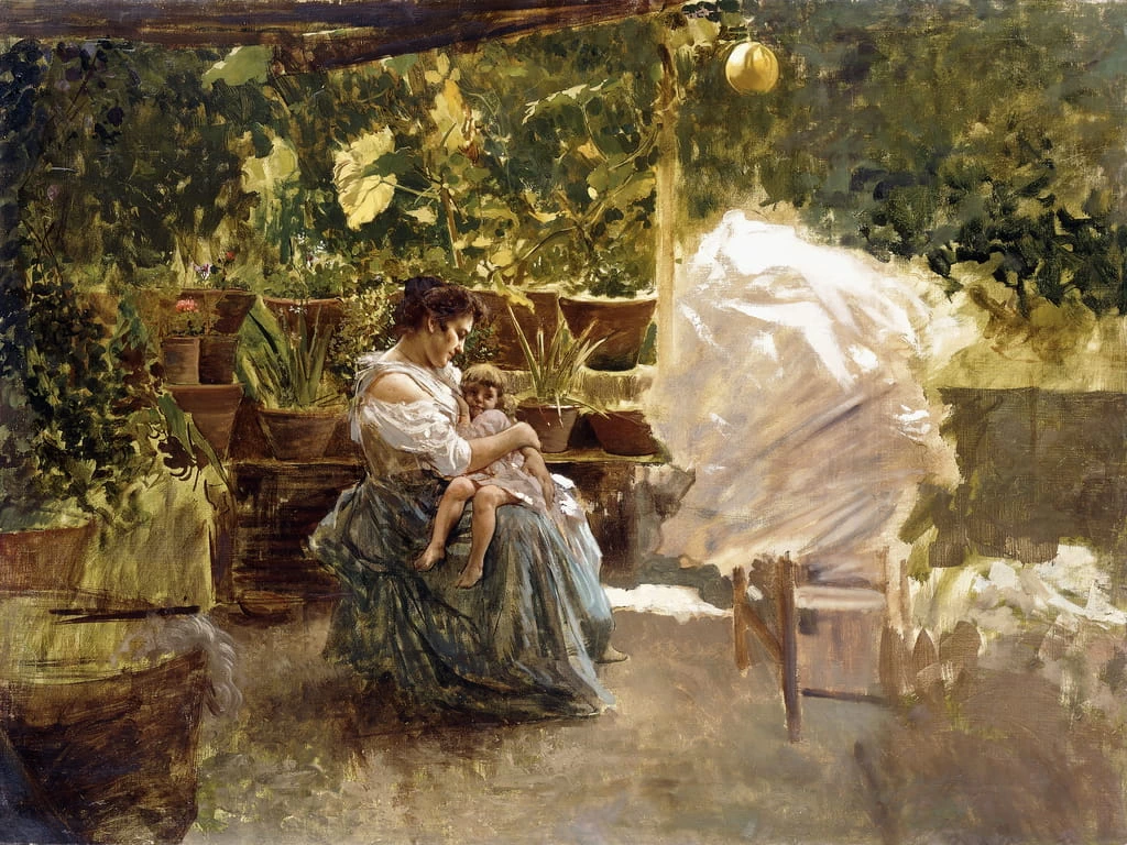 Una madre con il suo bambino in veranda